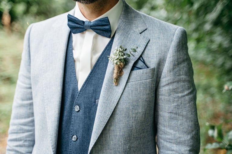 Groom in light blue suit